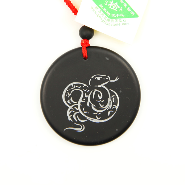 砭石生肖蛇圓佩圖1